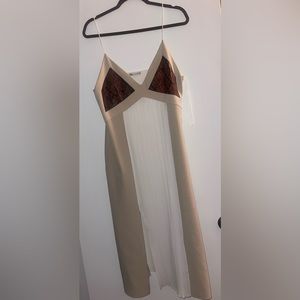 Zara brand. Size large. Worn once for a wedding! Very cute with leather patches.